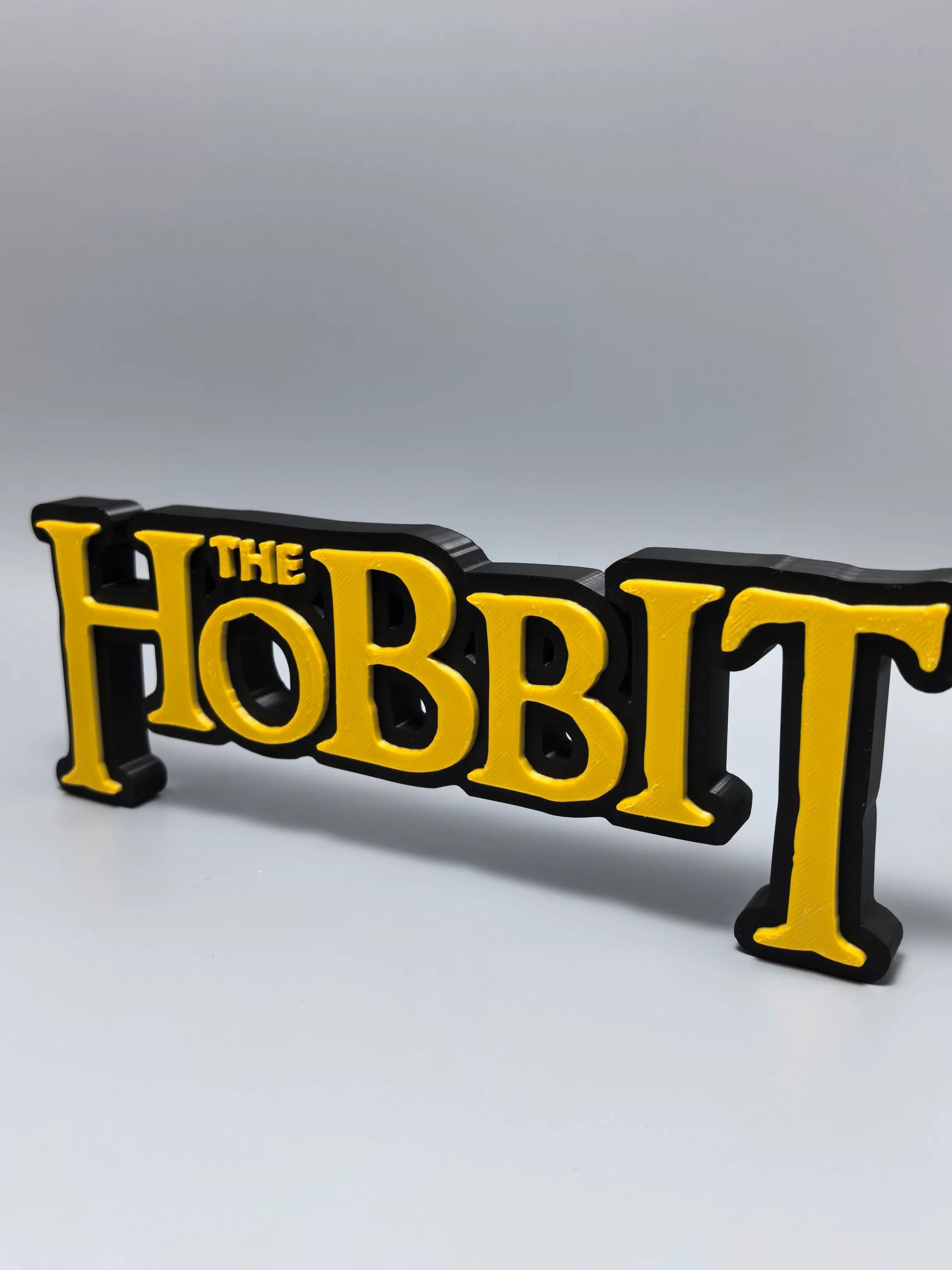 The Hobbit logo display sign material detail