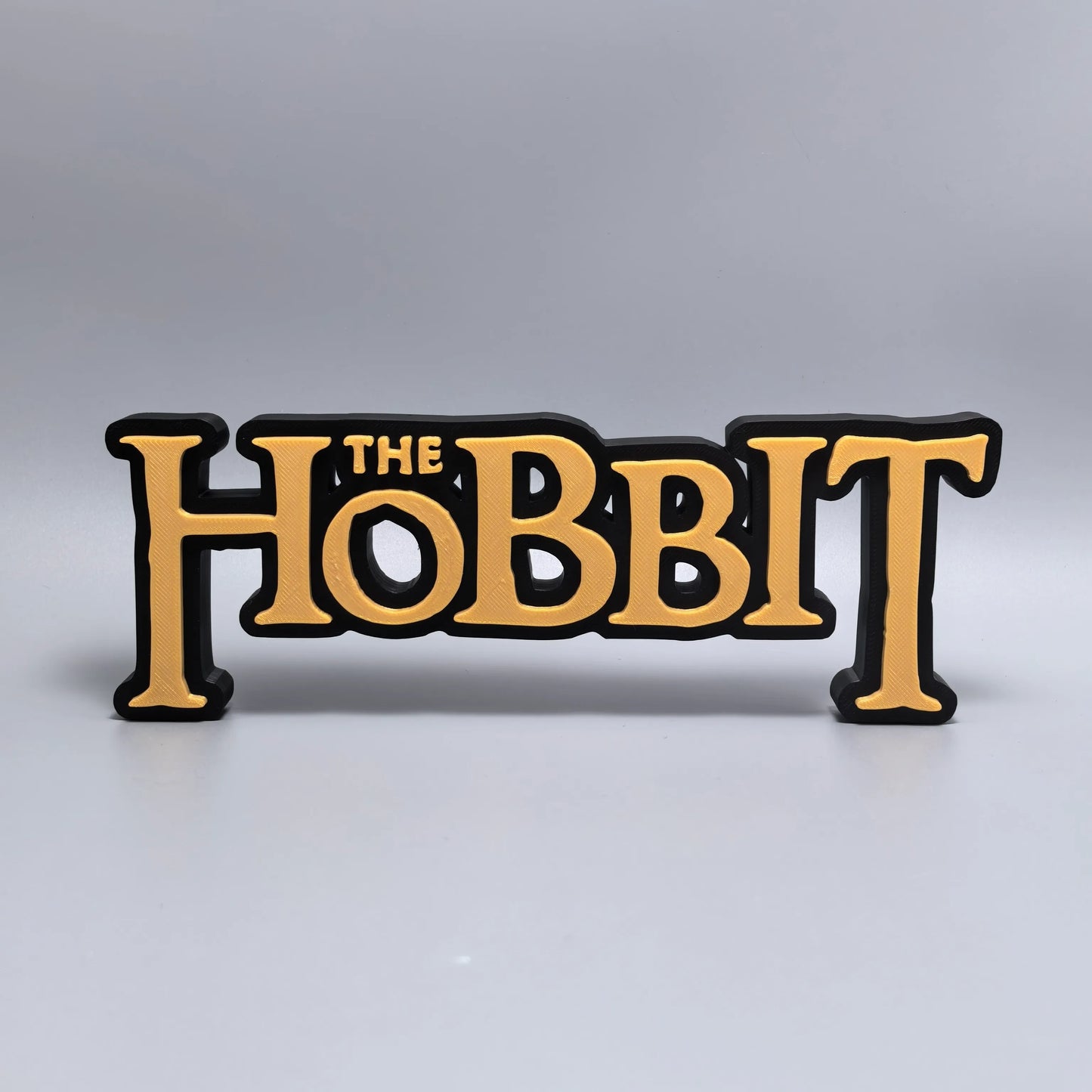 The Hobbit logo display sign detail
